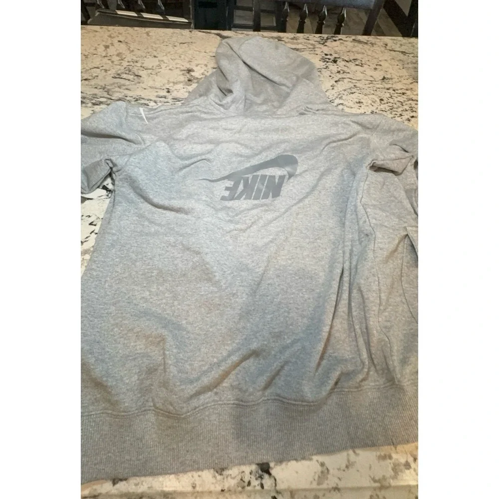 Kids size MEDIUM NIKE oversized fit gray zip up hooded jacket.